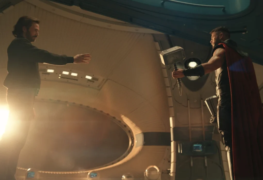 Steve Rogers reaches toward Thor, who holds Mjolnir, in new Avengers: Doomsday footage.