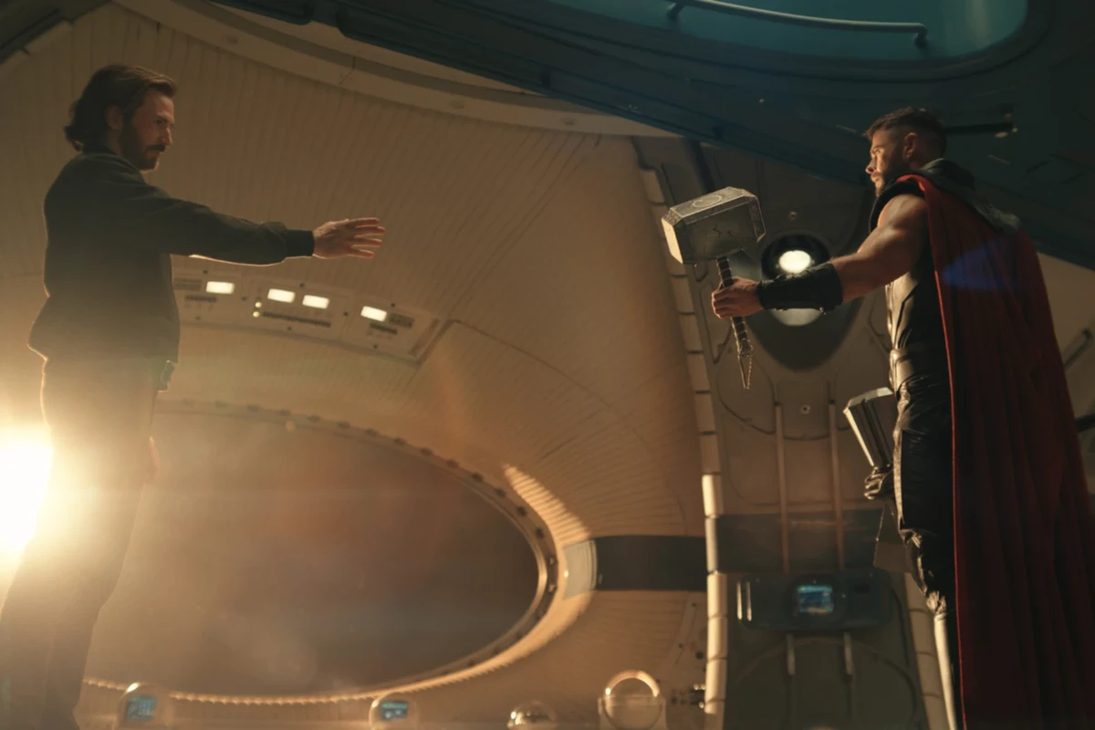 Steve Rogers reaches toward Thor, who holds Mjolnir, in new Avengers: Doomsday footage.
